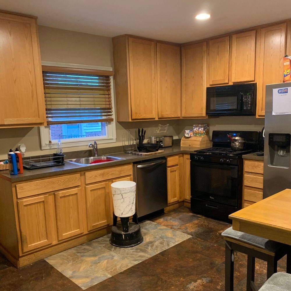 Clean, organized kitchen with stainless steel appliances